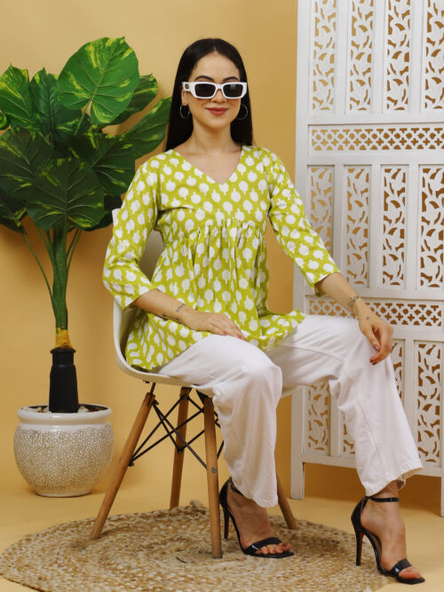 Woman wearing multicolor printed cotton top with V-neck and 3/4 sleeves – front view